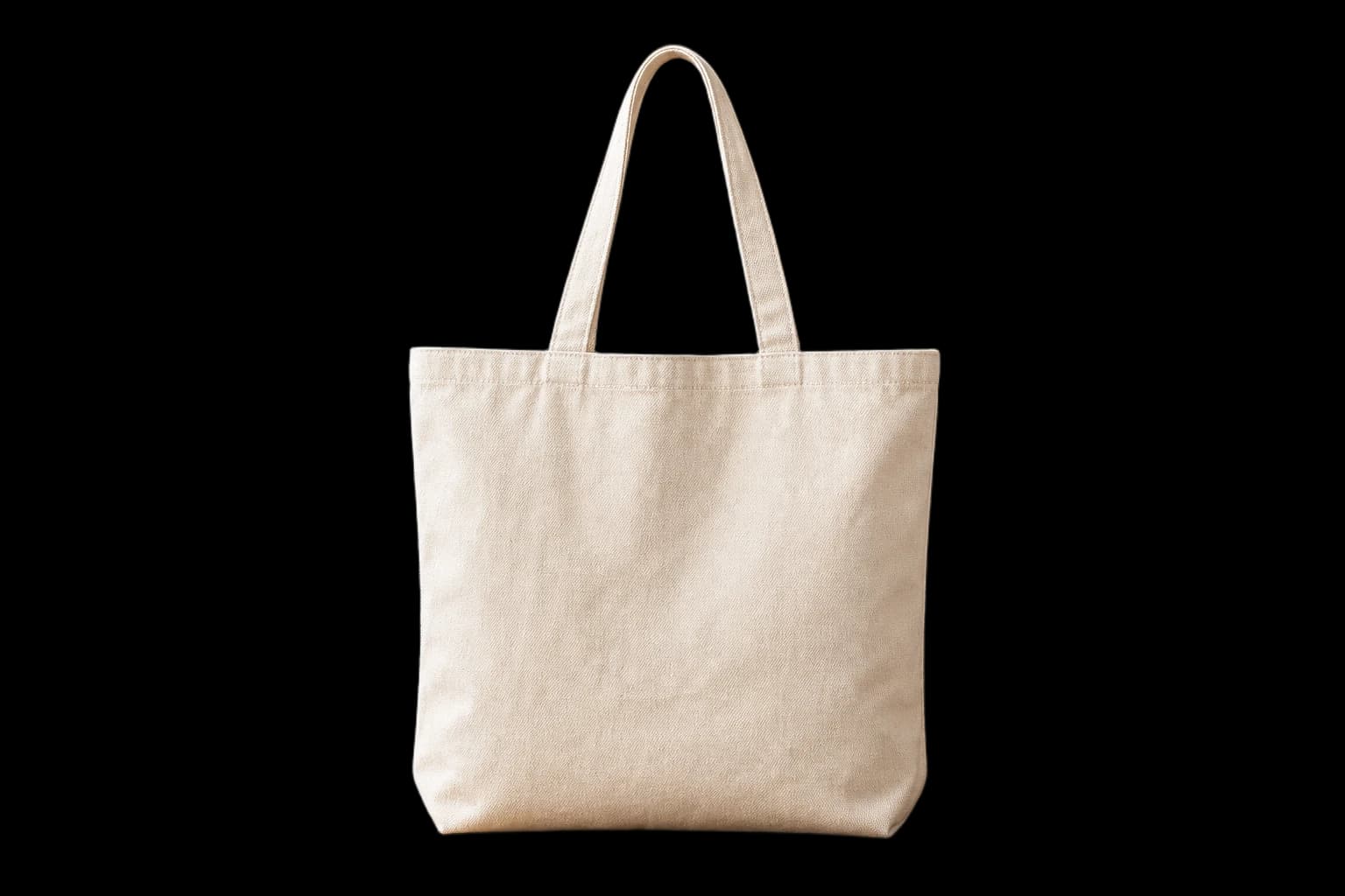 Cream canvas tote bag isolated on a transparent background by SudoMock