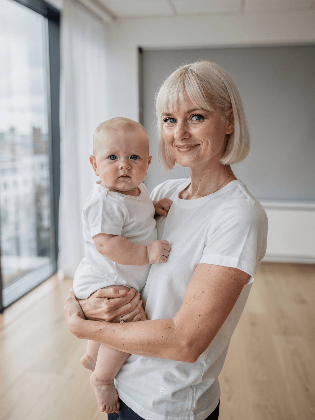 White Cotton Blend Baby Onesie Mockup on Model