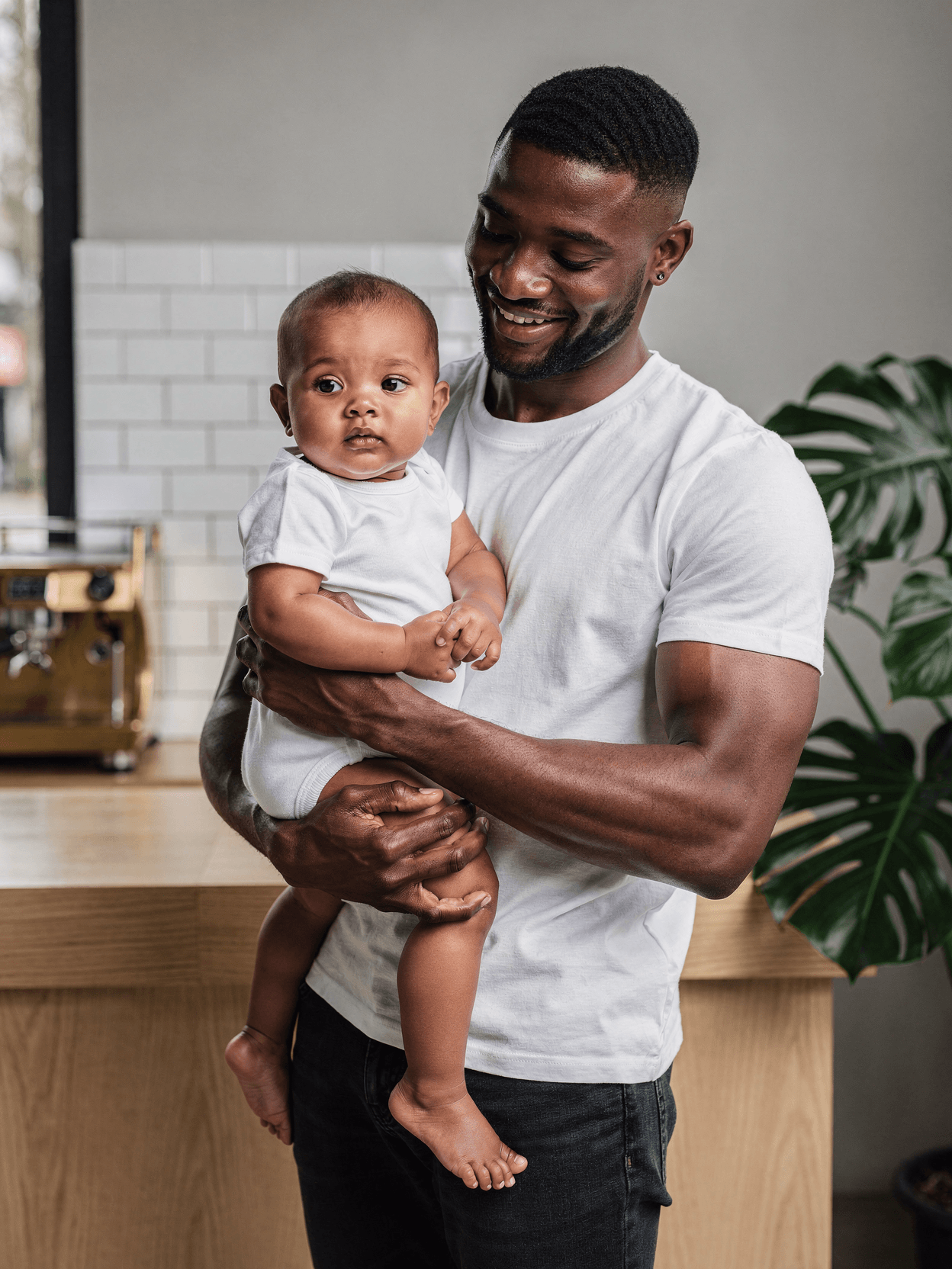 White Organic Cotton Baby Onesie Mockup on Model
