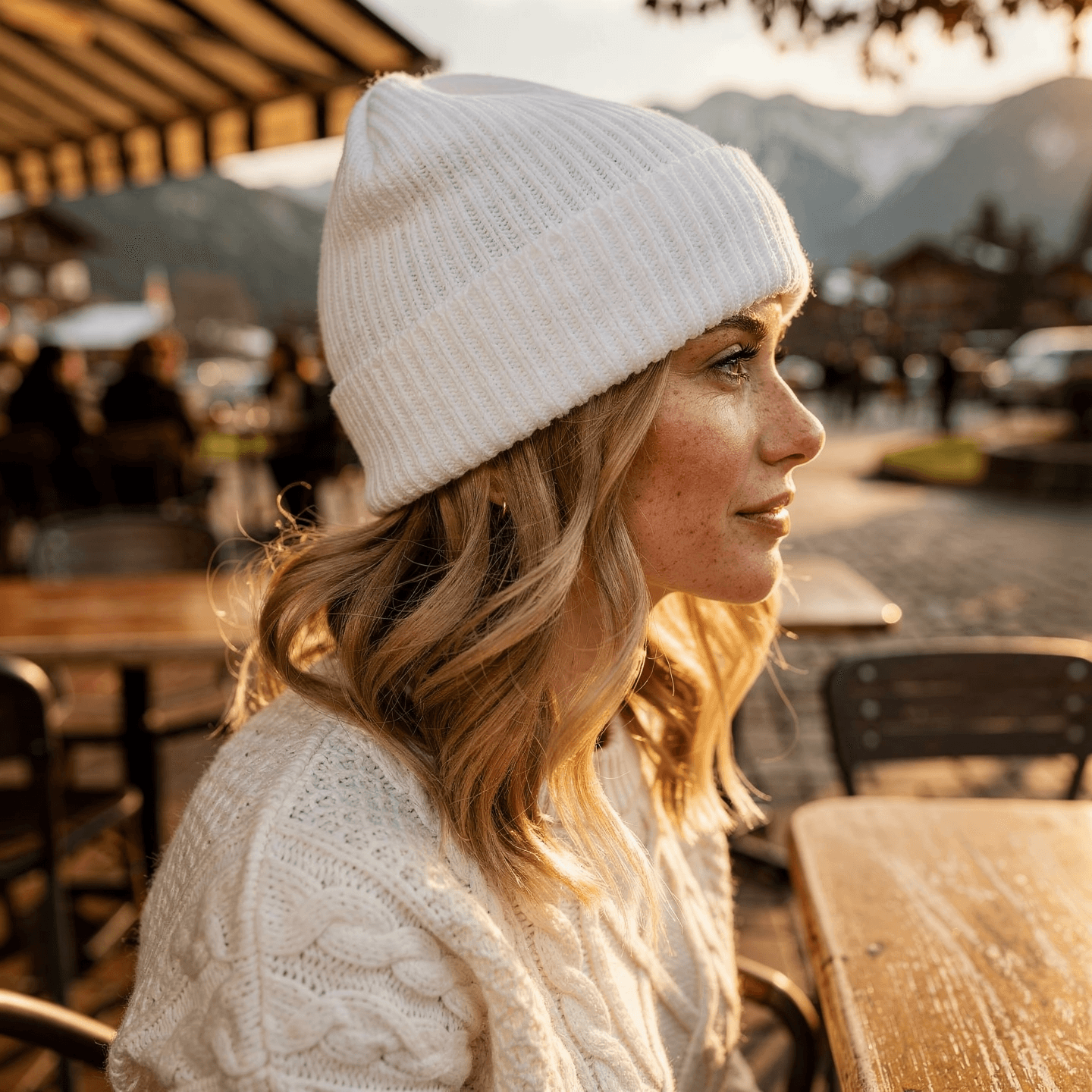 White Ribbed Knit Cuffed Beanie Mockup on Female Model — Side Profile on Model