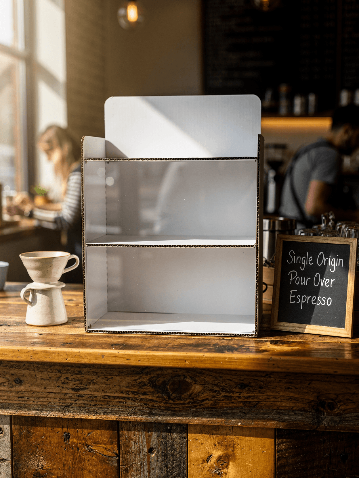 White Corrugated Counter Display Mockup - Café Setting