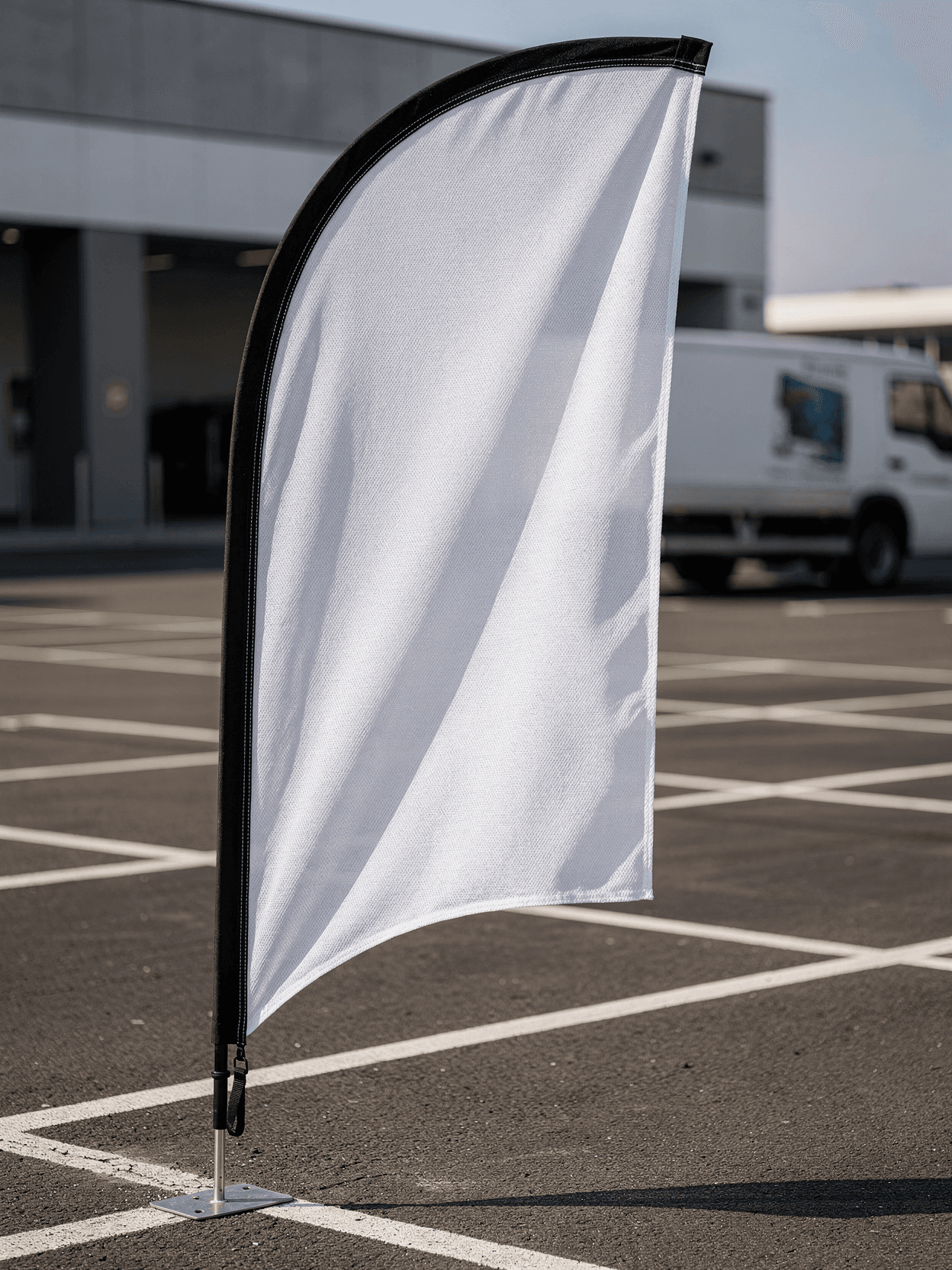 White Polyester Feather Flag Mockup - Parking Lot