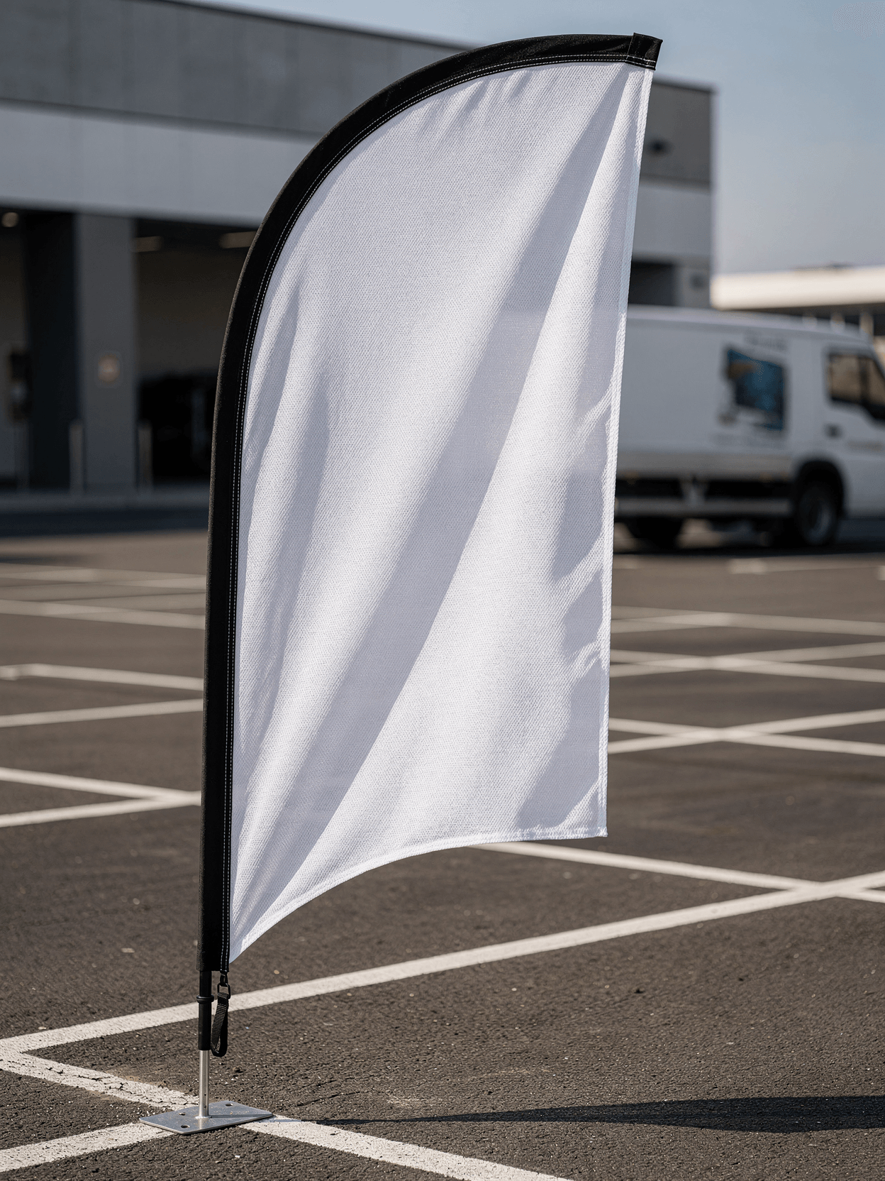 White Polyester Feather Flag Mockup - Parking Lot