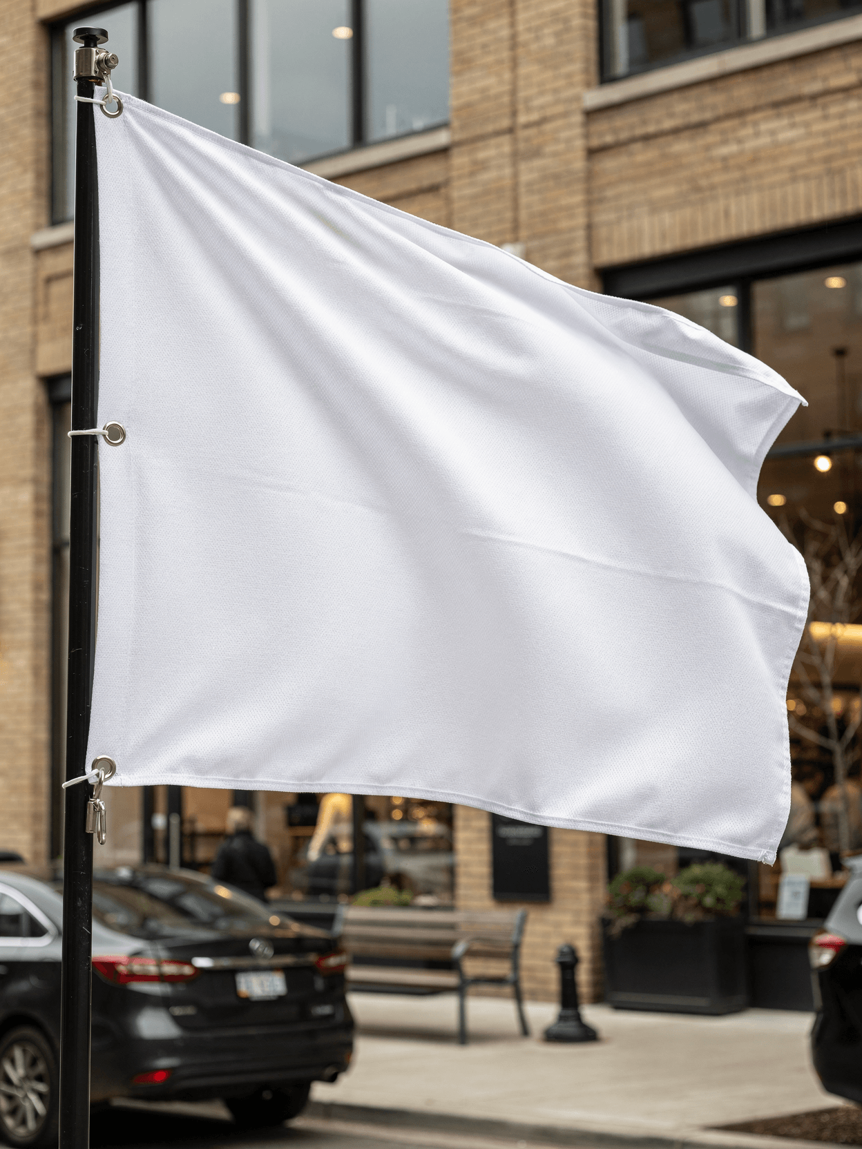 White Flag Mockup - Urban Storefront Pole Mount