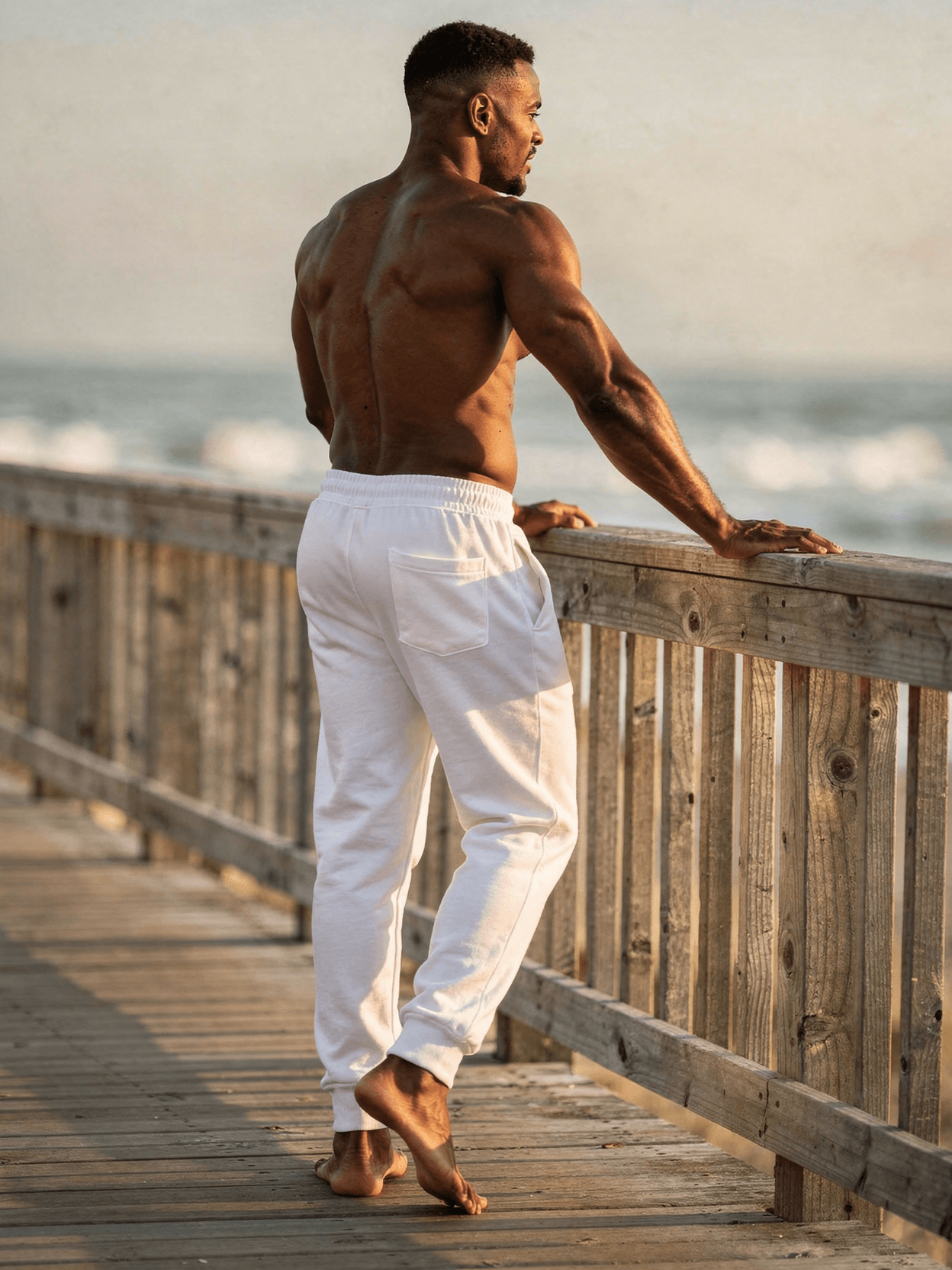 White Organic Cotton Joggers Mockup on Male Model — Back View