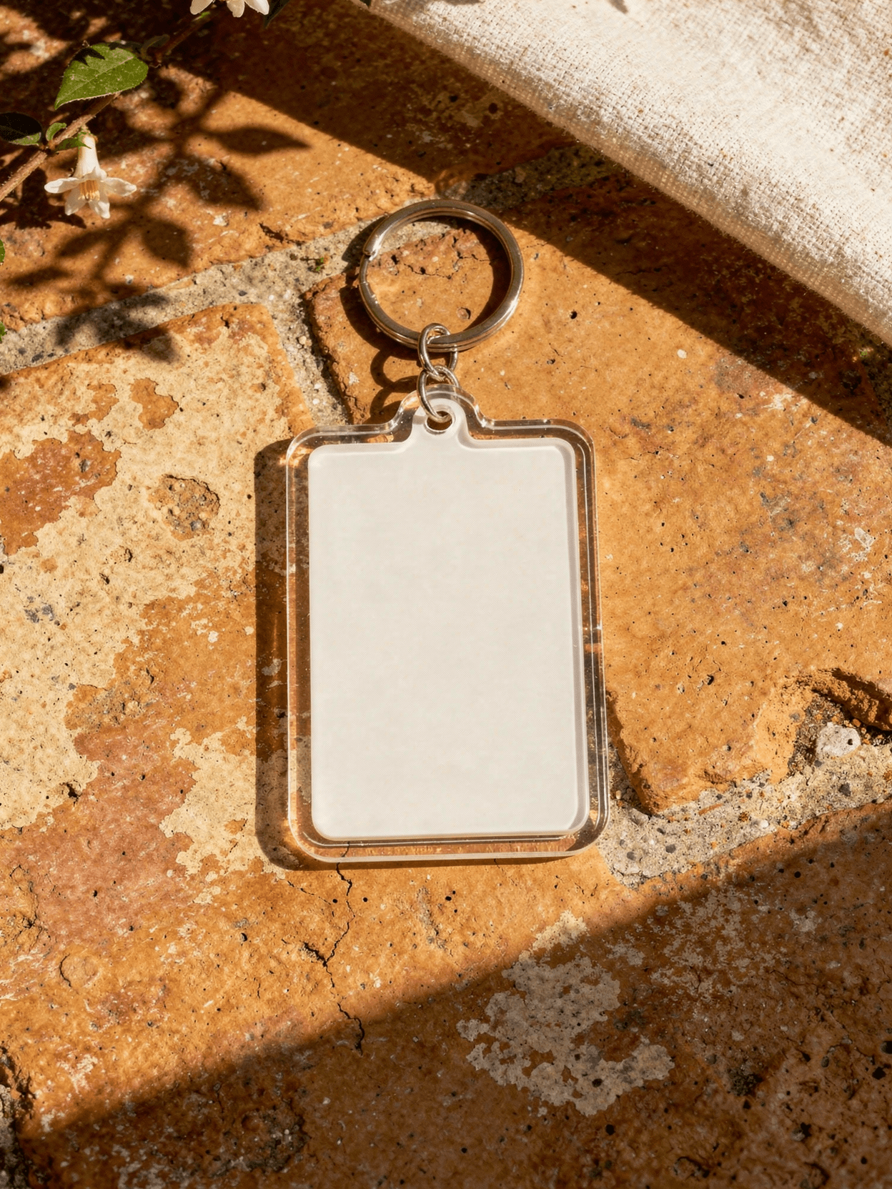 White Acrylic Rectangle Keychain Mockup - 6 Angles — 45-Degree Angled View