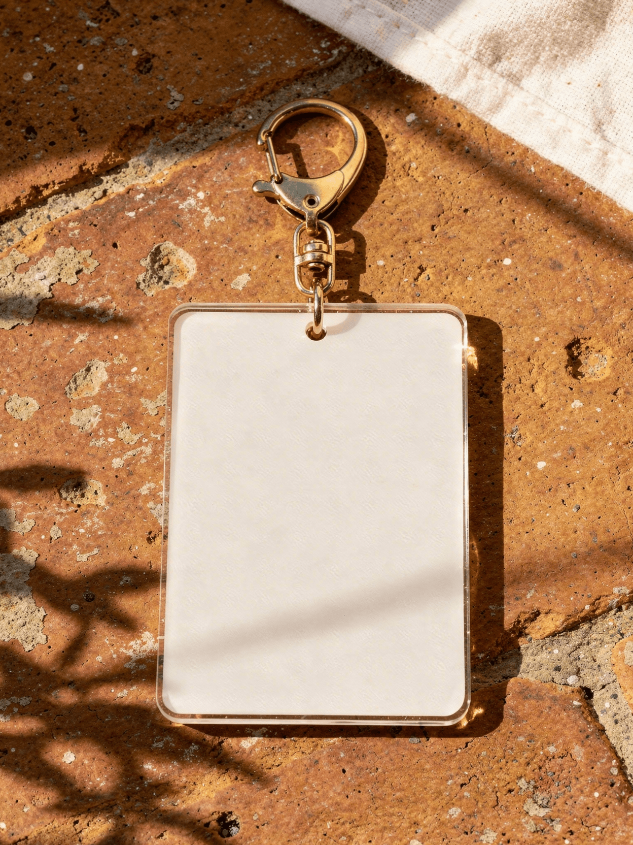 White Acrylic Square Keychain Mockup - 6 Angles — 45-Degree Angled View