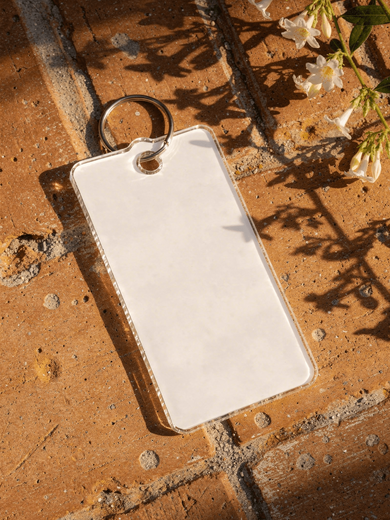 White Polycarbonate Rectangle Keychain Mockup — 45-Degree Angled View