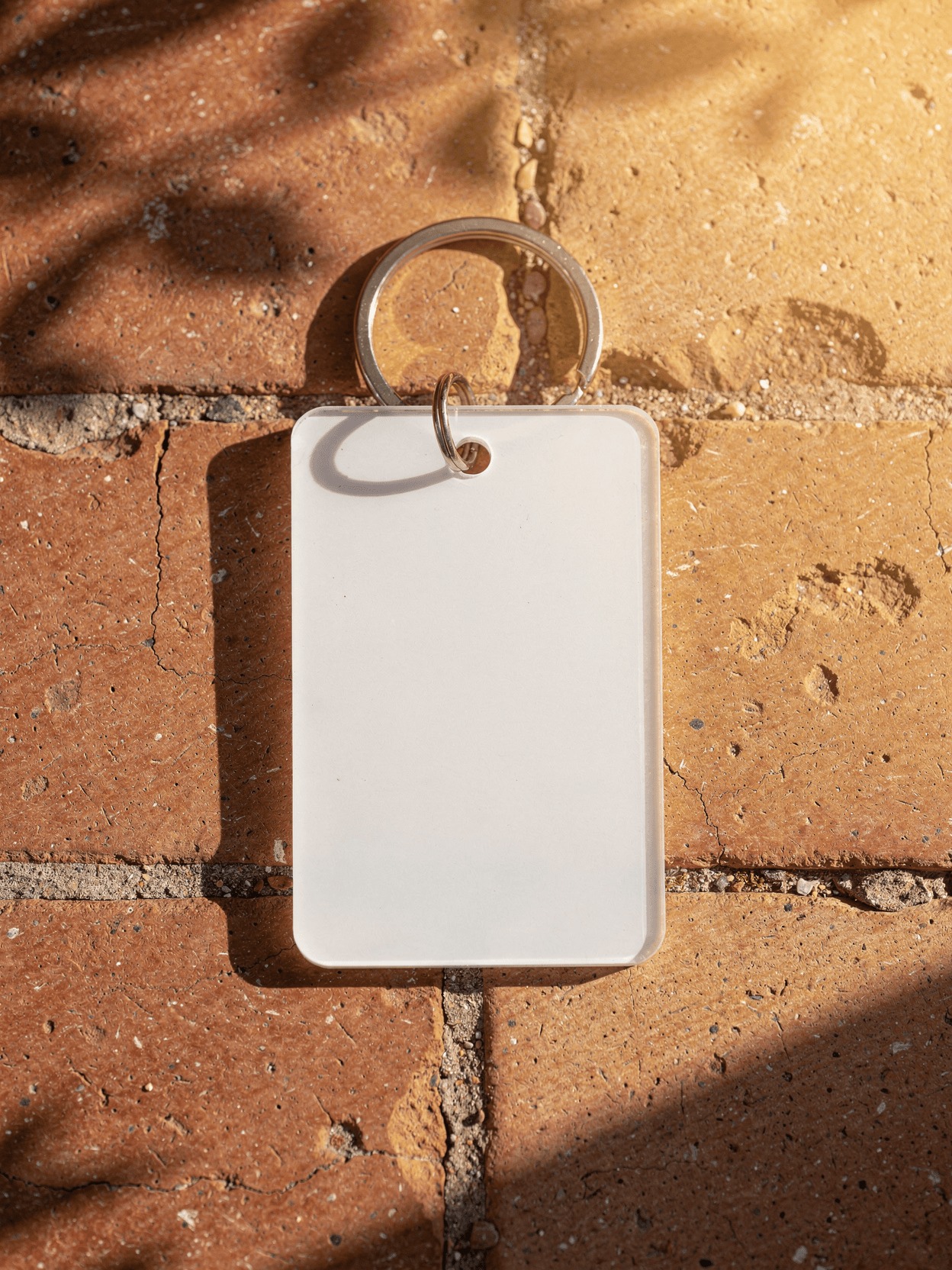 White Acrylic Keychain Mockup - Terracotta Setting
