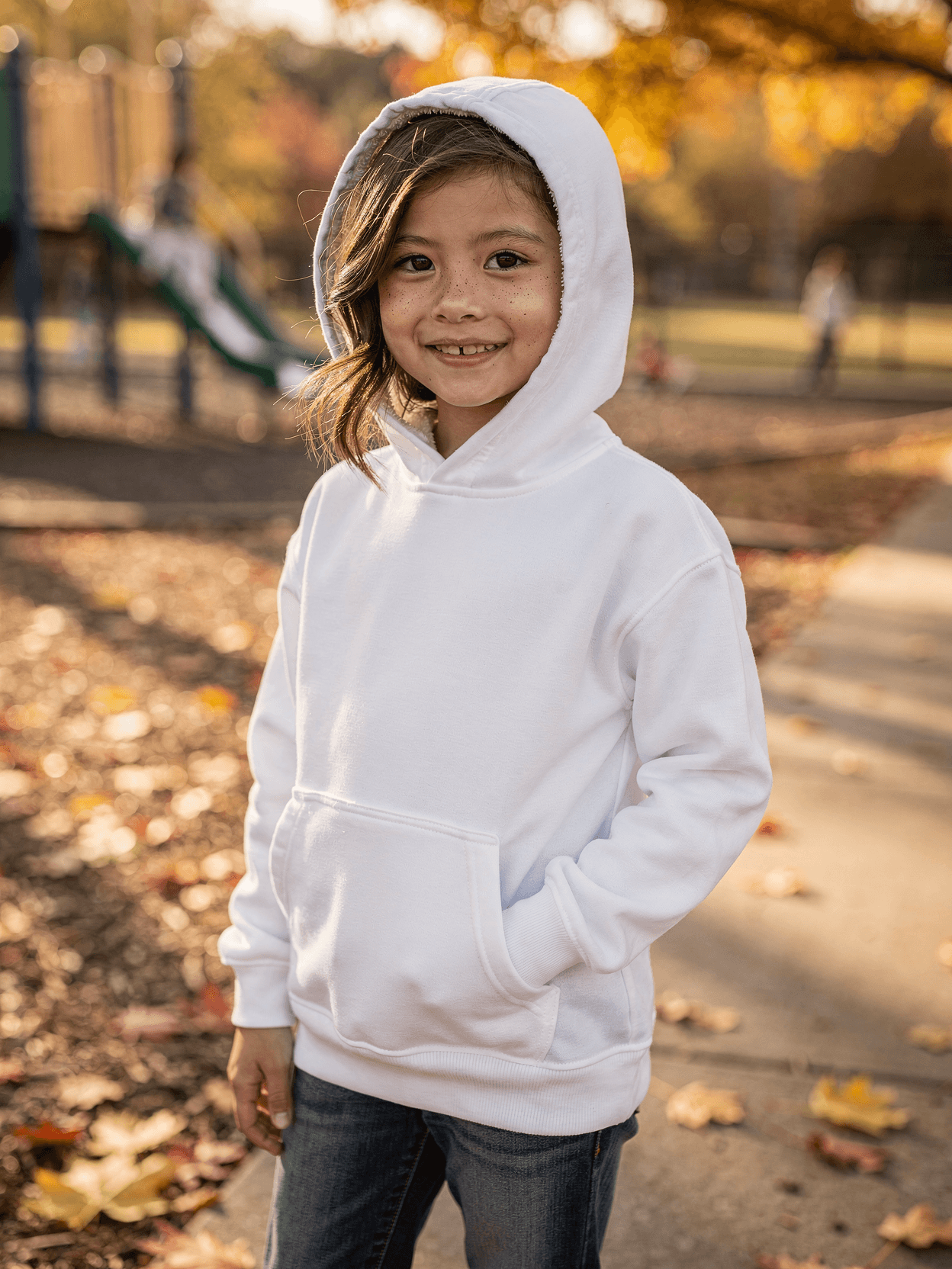 White CVC Blend Kids Hoodie Mockup on Girl Model