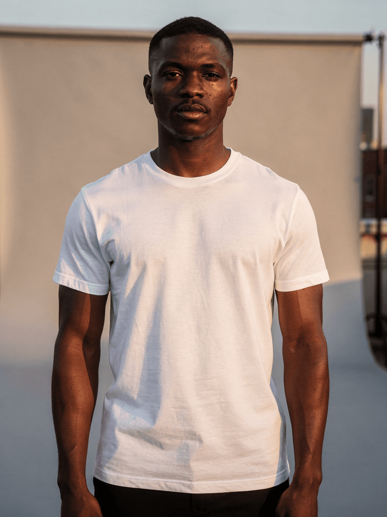 White Crewneck Tee Mockup – Rooftop Cityscape